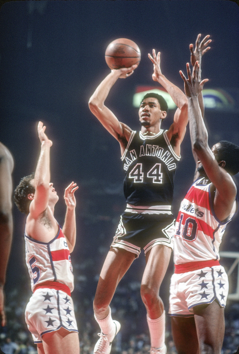 Thompson (above) truly did seem like he could walk on air; Gervin was known for his finishing skill around the rim.