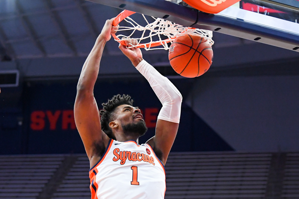 Quincy Guerrier dunks against the Buffalo Bulls on December 19, 2020 at the Carrier Dome in Syracuse, New York. 