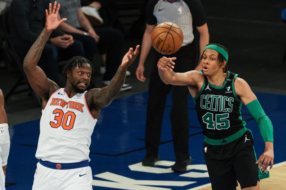 Boston Celtics guard Romeo Langford (45) deflects the ball away from New York Knicks forward Julius Randle during a game at Madison Square Garden. (Vincent Carchietta/USA TODAY Sports)