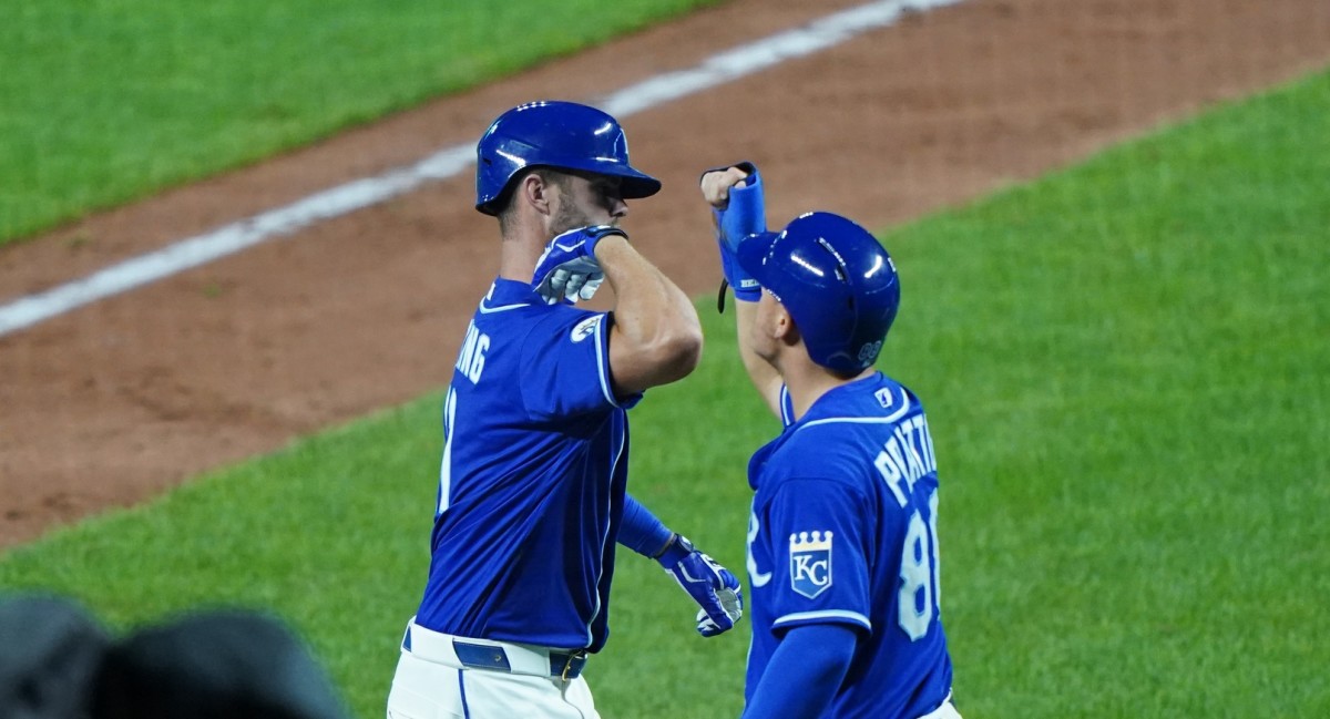 Jul 20, 2020; Kansas City, Missouri, USA; Kansas City Royals center fielder Bubba Starling (11) is congratulated by infielder Nick Pratto (88) after hitting a two run home run in the eighth inning against the Houston Astros at Kauffman Stadium. Mandatory Credit: Denny Medley-USA TODAY Sports