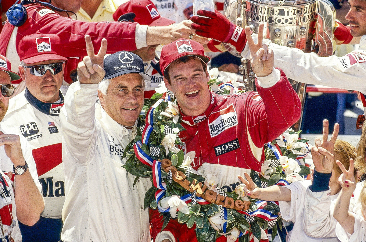 Penske (left) milks his moment with 1994 winner Al Unser Jr.