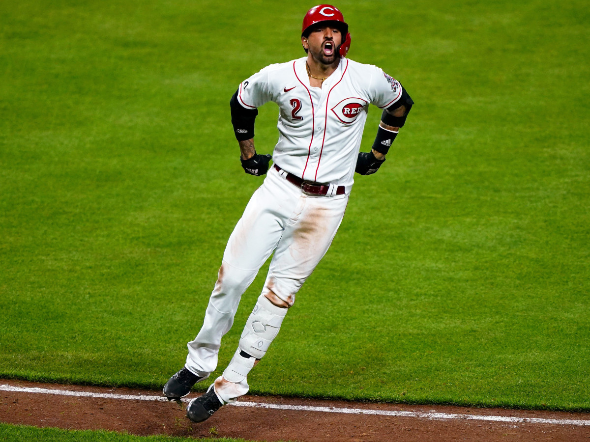 Cincinnati Reds right fielder Nick Castellanos (2) reacts after hitting a solo home run to give the 3-2 lead in the seventh inning during a baseball game against the Pittsburgh Pirates, Monday, April 5, 2021, at Great American Ball Park in Cincinnati. The Cincinnati Reds won, 5-3.