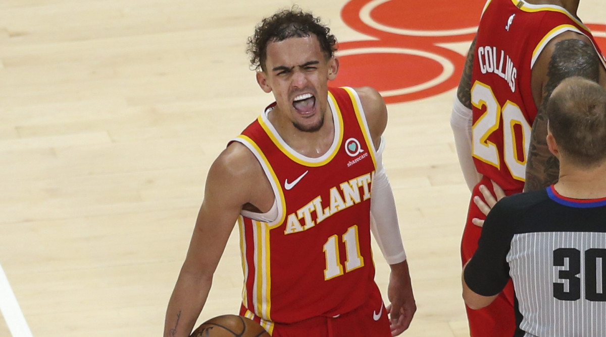 Trae Young celebrates near the end of Game 3 against the Knicks