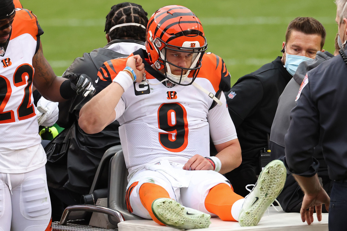 Joe Burrow is carted off the field after a knee injury against the Washington Football Team