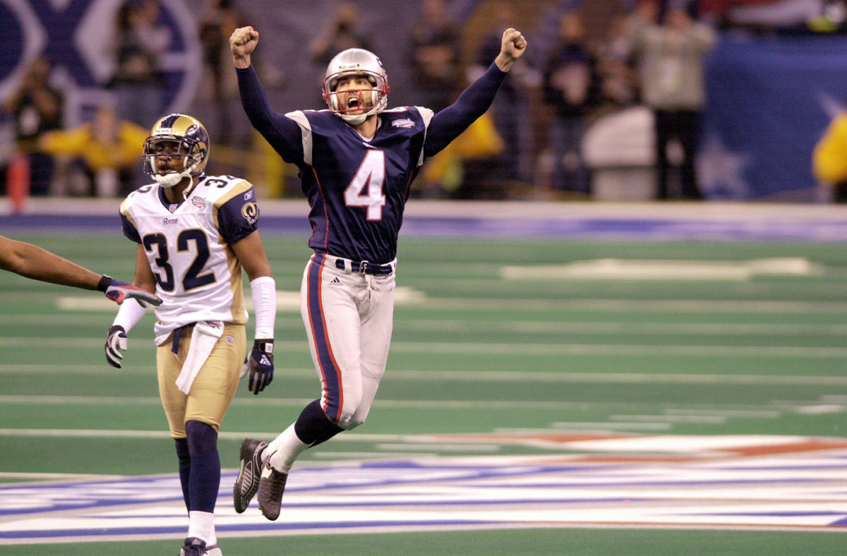 Adam Vinatieri celebrates the game-winning field goal of Super Bowl XXXVI