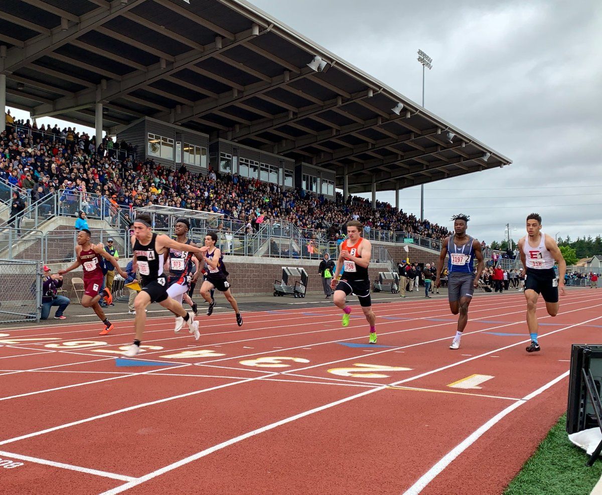 Camden Verstrate wins the 100-meter dash in the 2A state meet for Cheney High School.