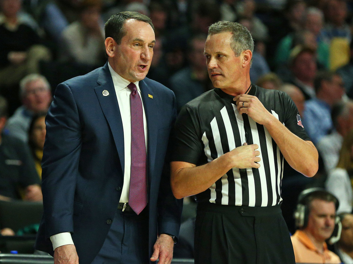 Coach K and a referee