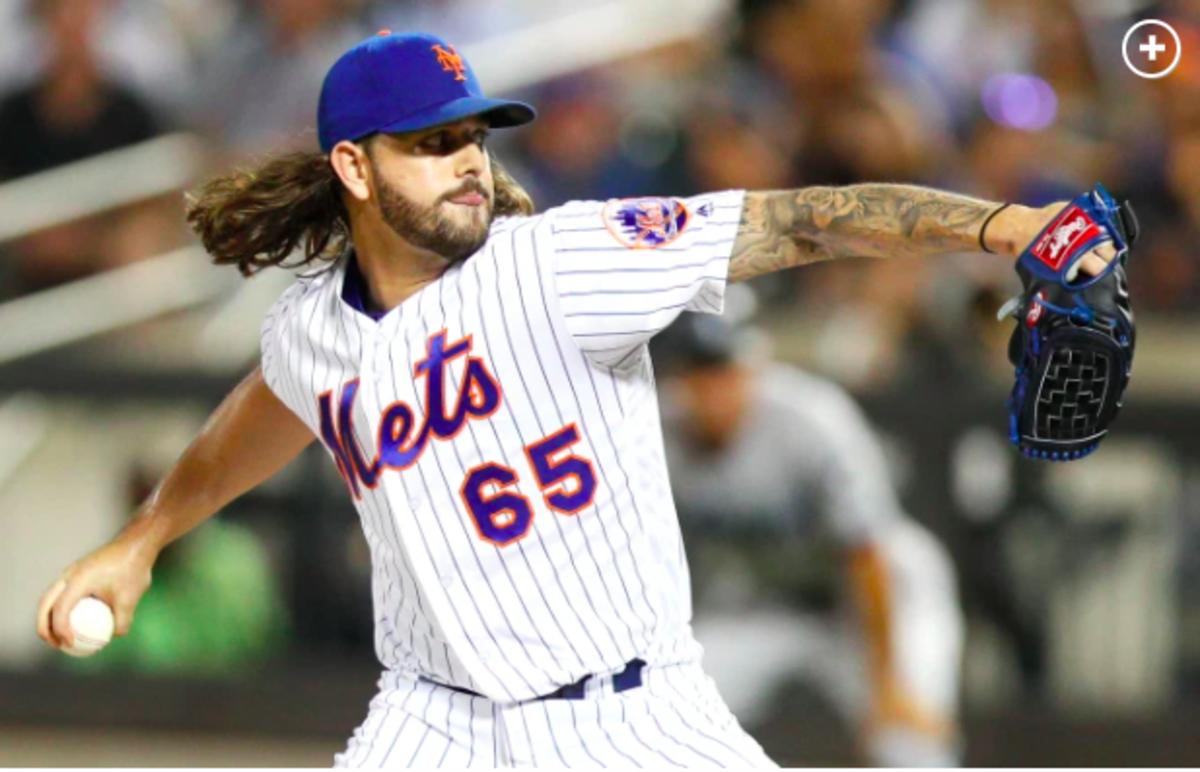 Mets relief pitcher Robert Gsellman fires home a pitch