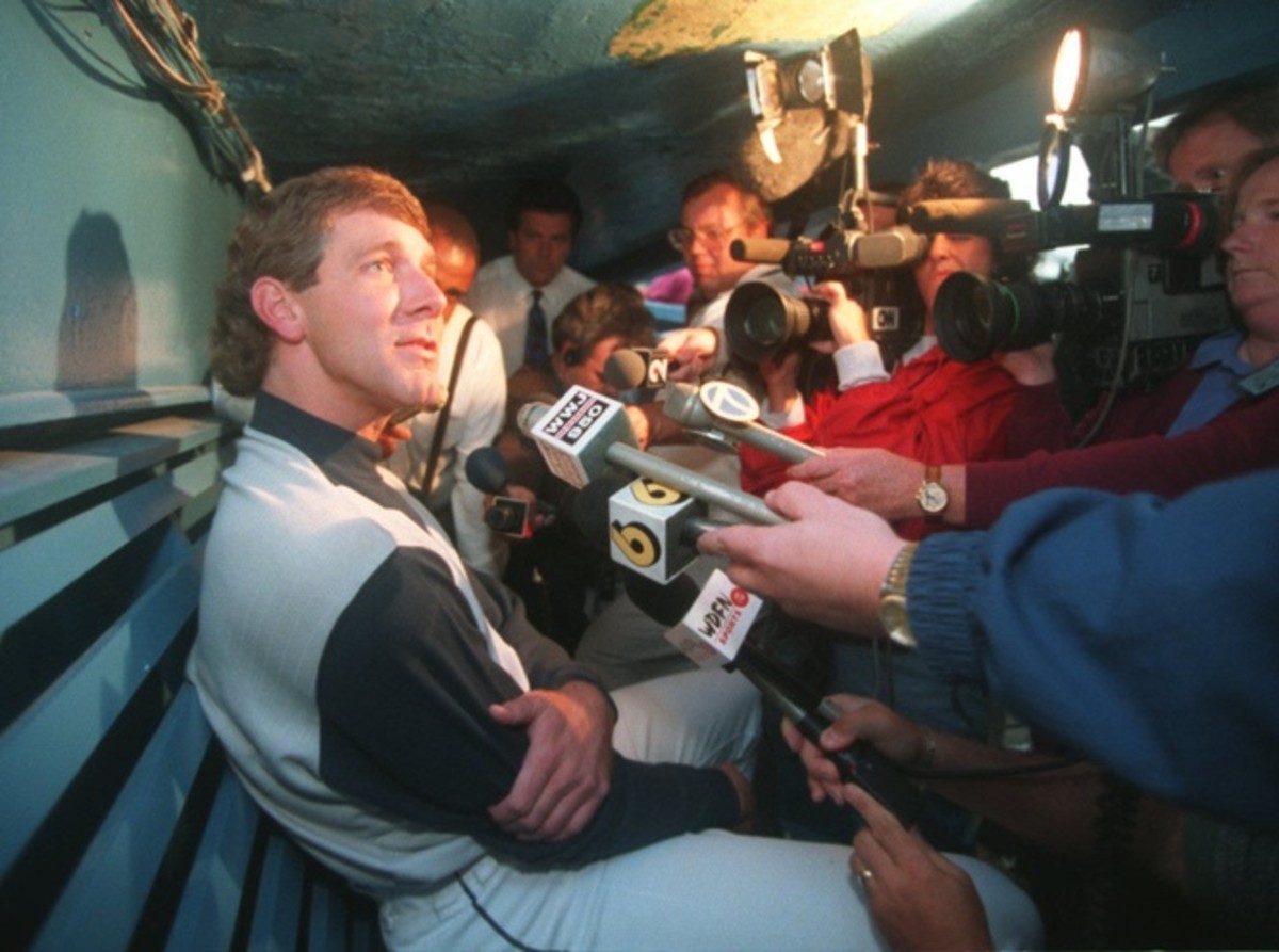 Tigers closer Mike Henneman, the team's union player rep, speaks to the media in the dugout in Tiger Stadium on Aug. 11, 1994, the last day before the players strike. Henneman Talks