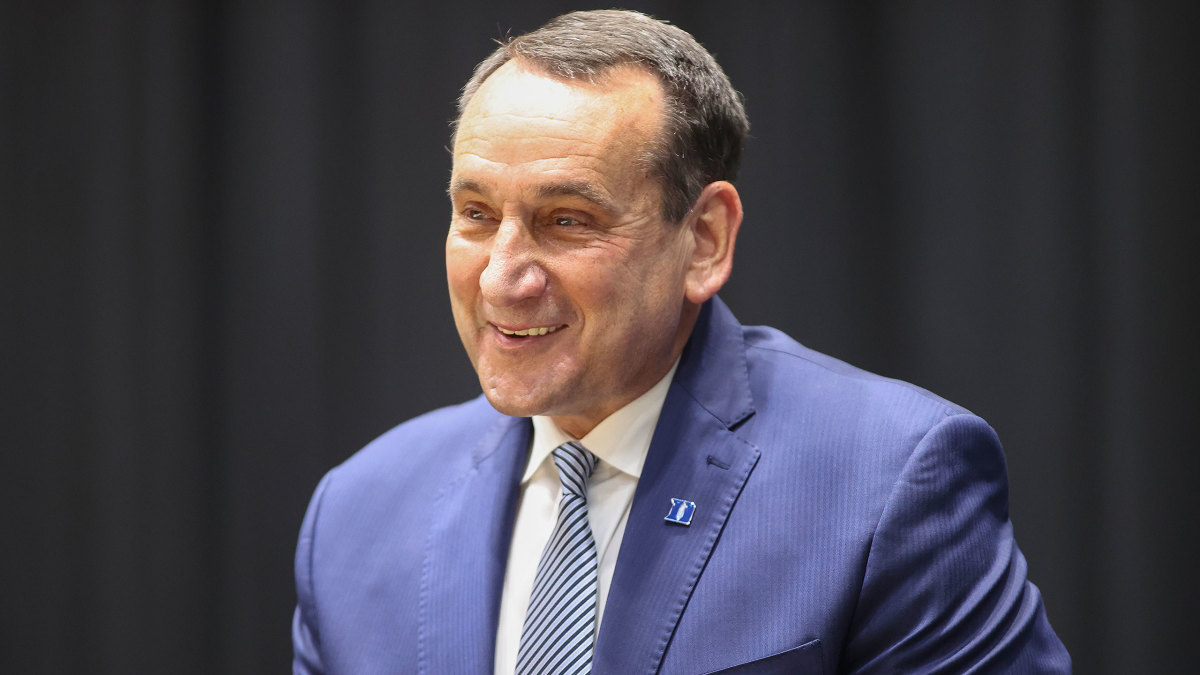 Coach K smiles during his retirement presser