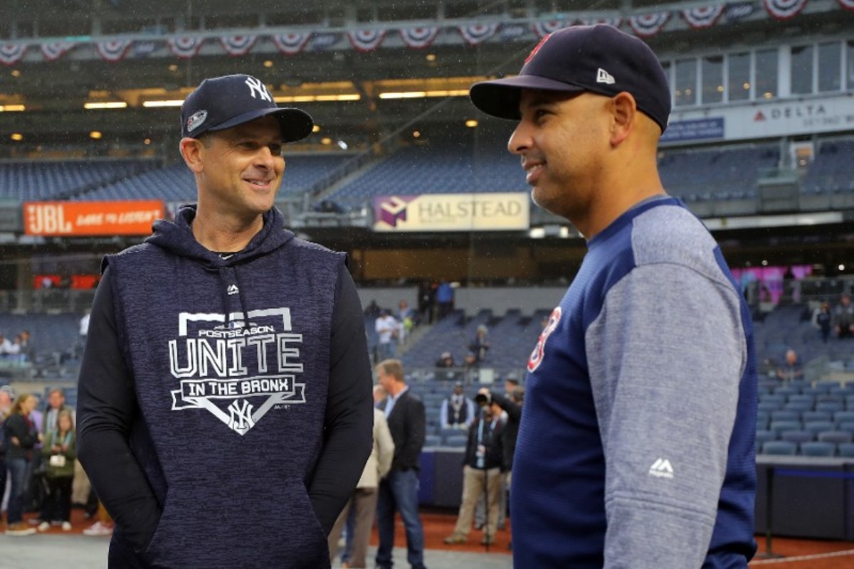 Red Sox manager Alex Cora with Yankees manager Aaron Boone