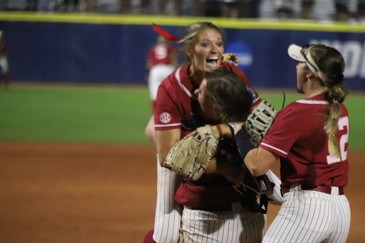Montana Fouts celebrates a perfect game against UCLA in the WCWS on June 4, 2021.