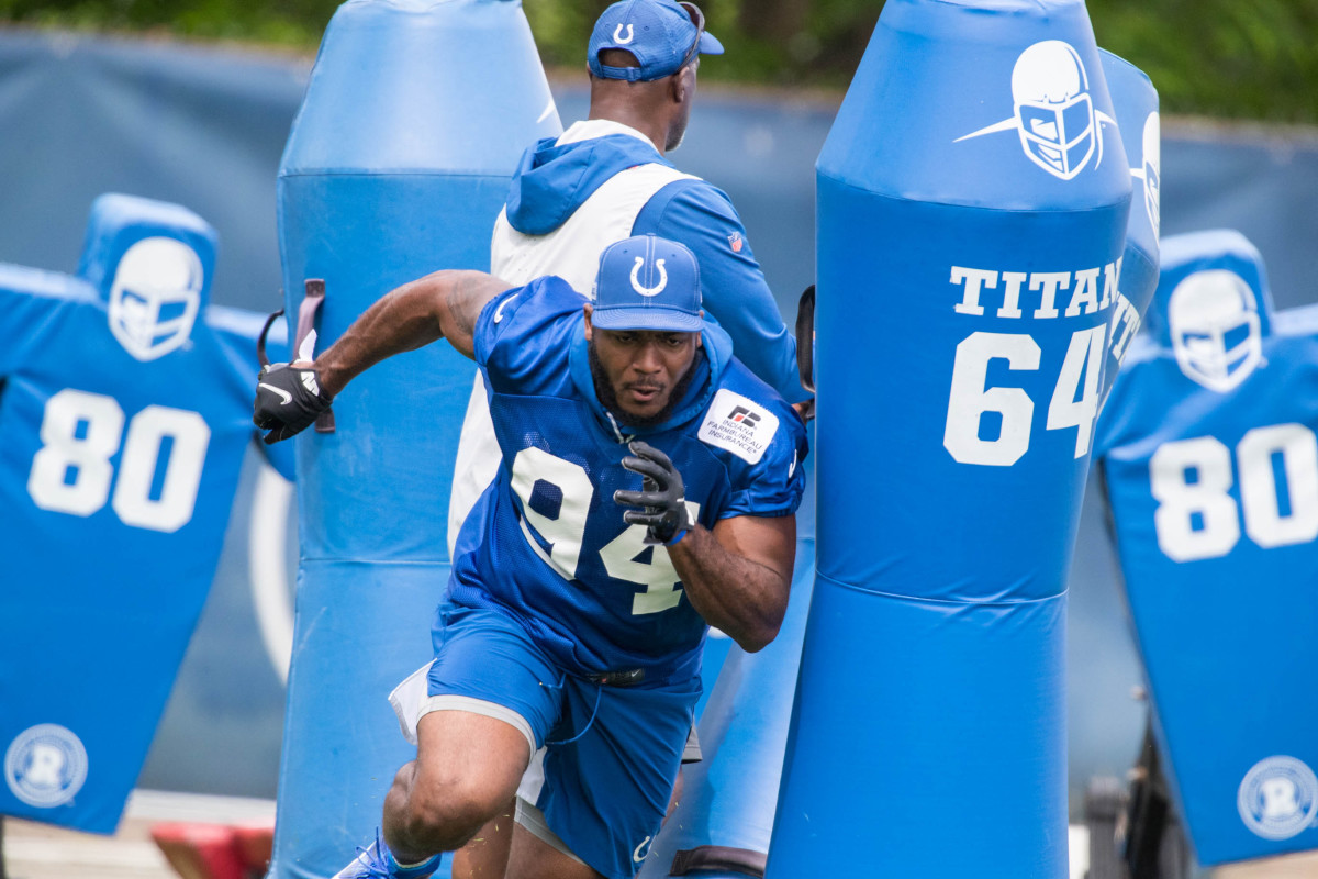 May 27, 2021; Indianapolis, Indiana, USA; Indianapolis Colts defensive end Tyquan Lewis (94) works out during Indianapolis Colts OTAs.
