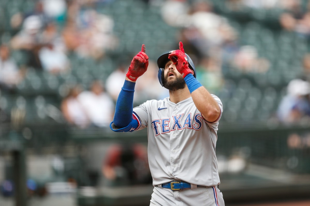 May 30, 2021; Seattle, Washington, USA; Texas Rangers right fielder Joey Gallo (13) celebrates after hitting a two-run home run against the Seattle Mariners during the seventh inning at T-Mobile Park.