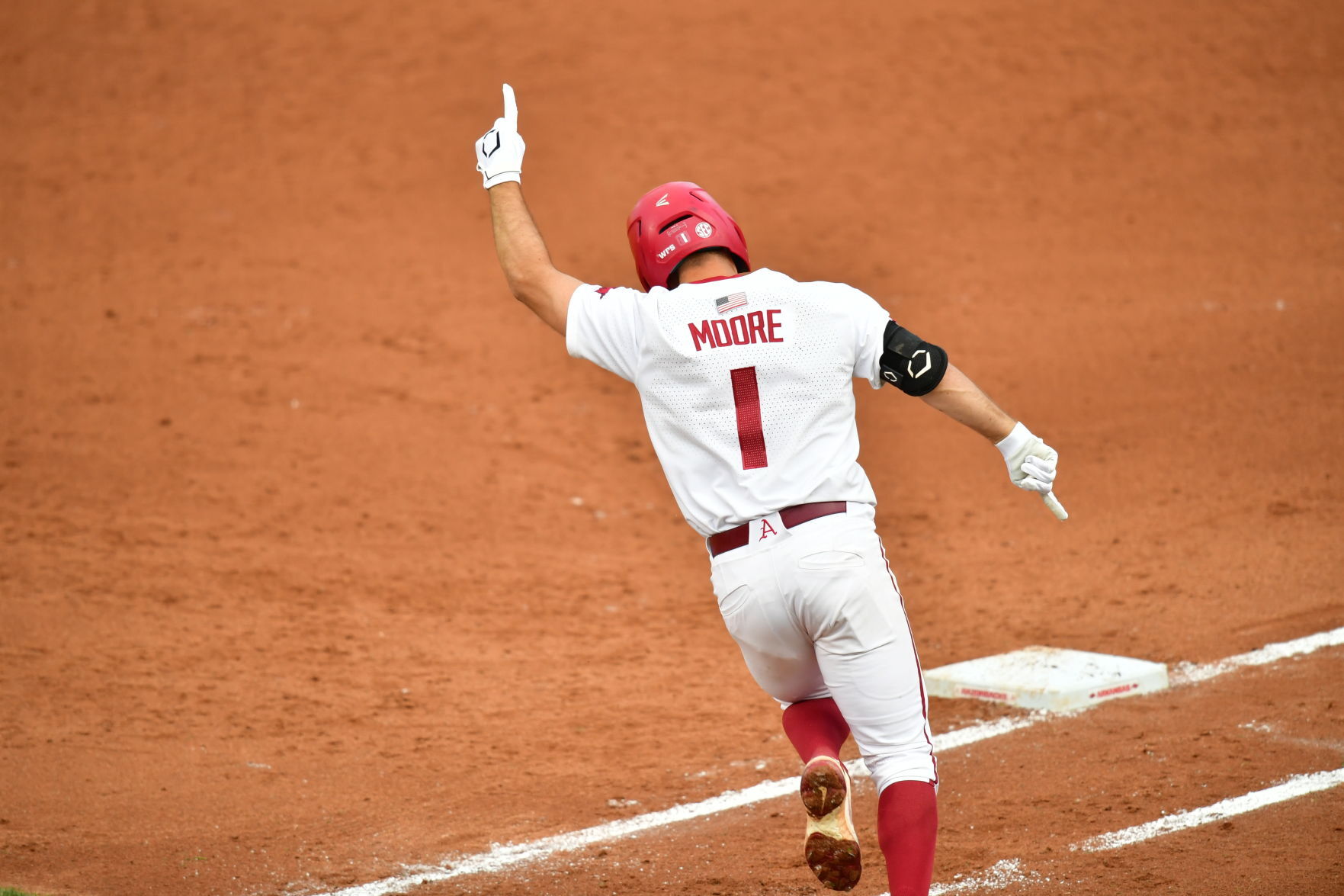 Arkansas' Robert Moore celebrates his game-tying home run (2)