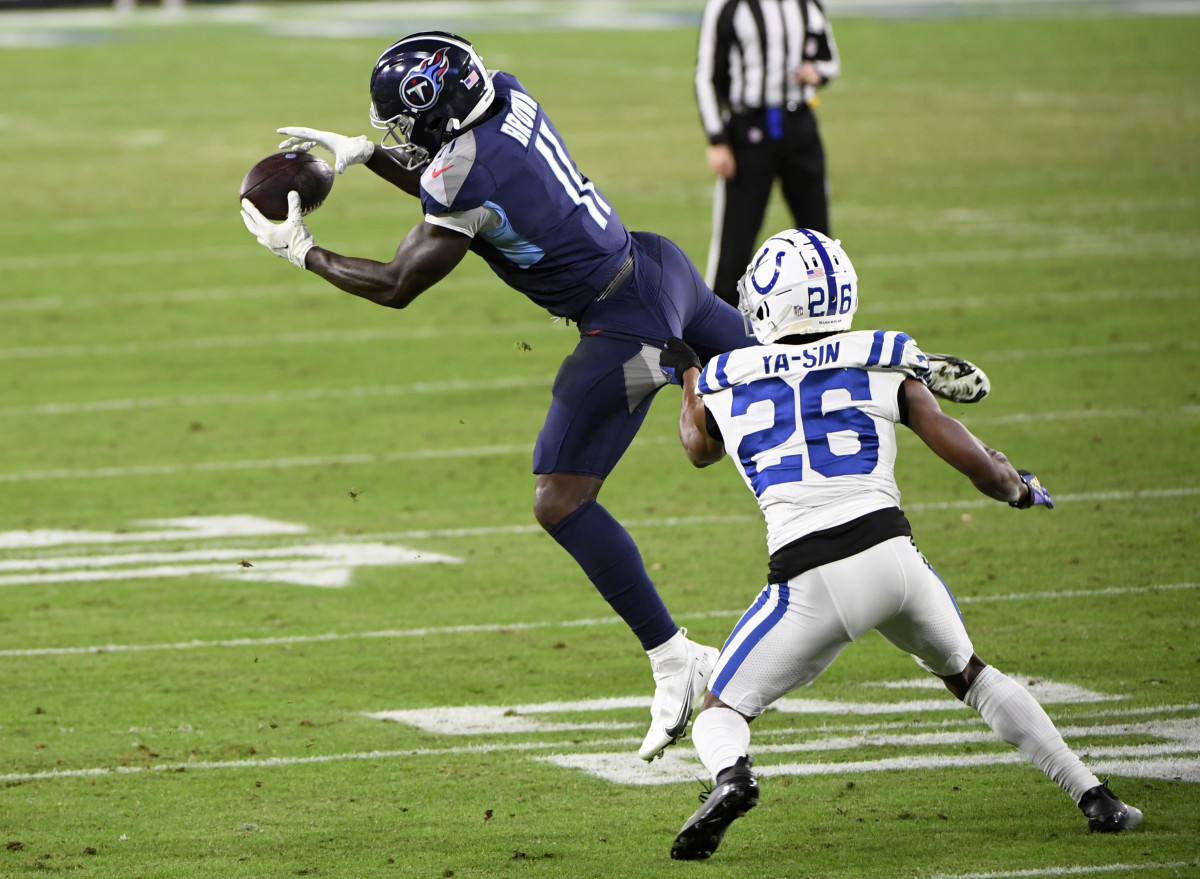 Nov 12, 2020; Nashville, Tennessee, USA; Tennessee Titans wide receiver A.J. Brown (11) makes a catch in front of Indianapolis Colts cornerback Rock Ya-Sin (26) during the second half at Nissan Stadium.