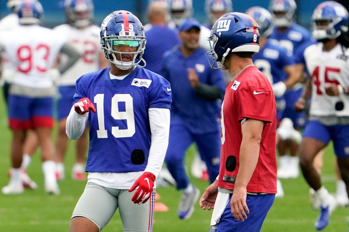 New York Giants wide receiver Kenny Golladay (19) and quarterback Daniel Jones (8) talk during OTA practice at the Quest Diagnostics Training Center on Friday, June 4, 2021, in East Rutherford.