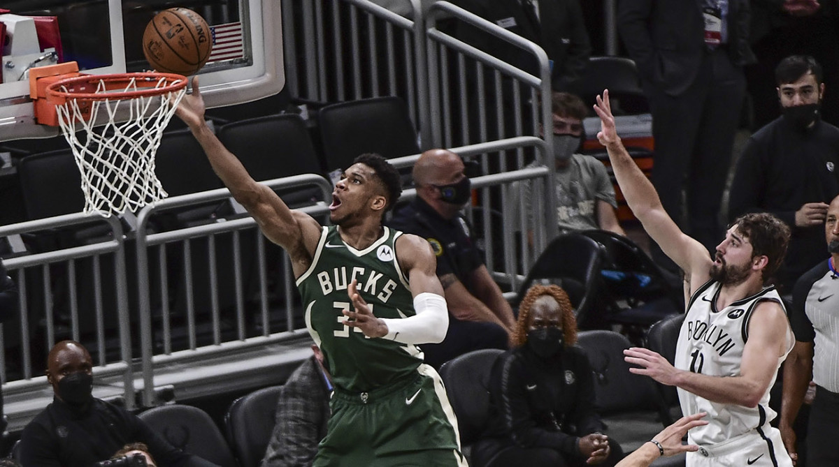 Milwaukee Bucks' Giannis Antetokounmpo and Brooklyn Nets' Joe Harris