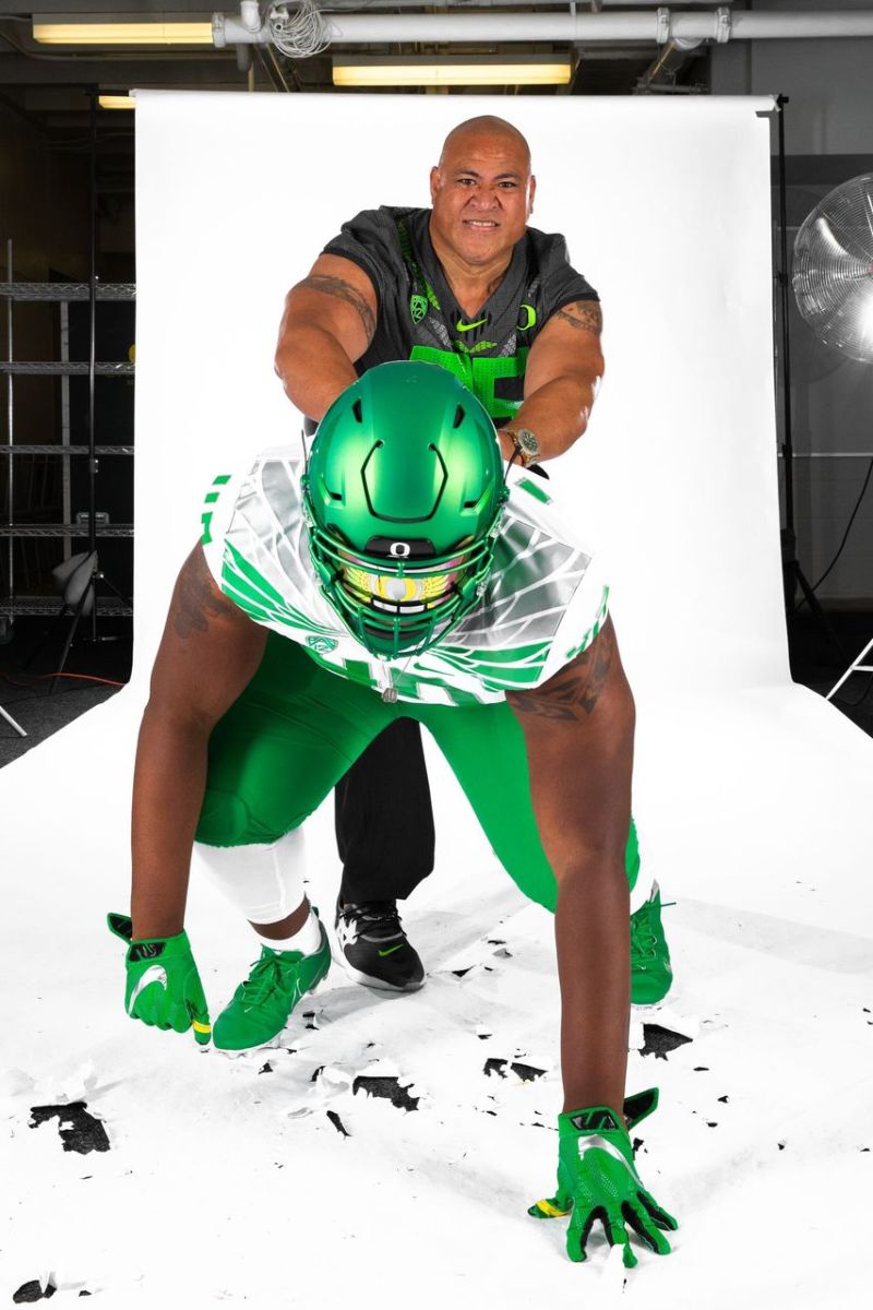 Sir Mells poses for a photo during his official visit to Oregon with Defensive Line Coach Joe Salave'a.