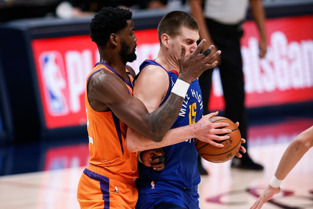 Denver Nuggets MVP Nikola Jokic sends Phoenix Suns center Deandre Ayton an  autographed jersey - ESPN