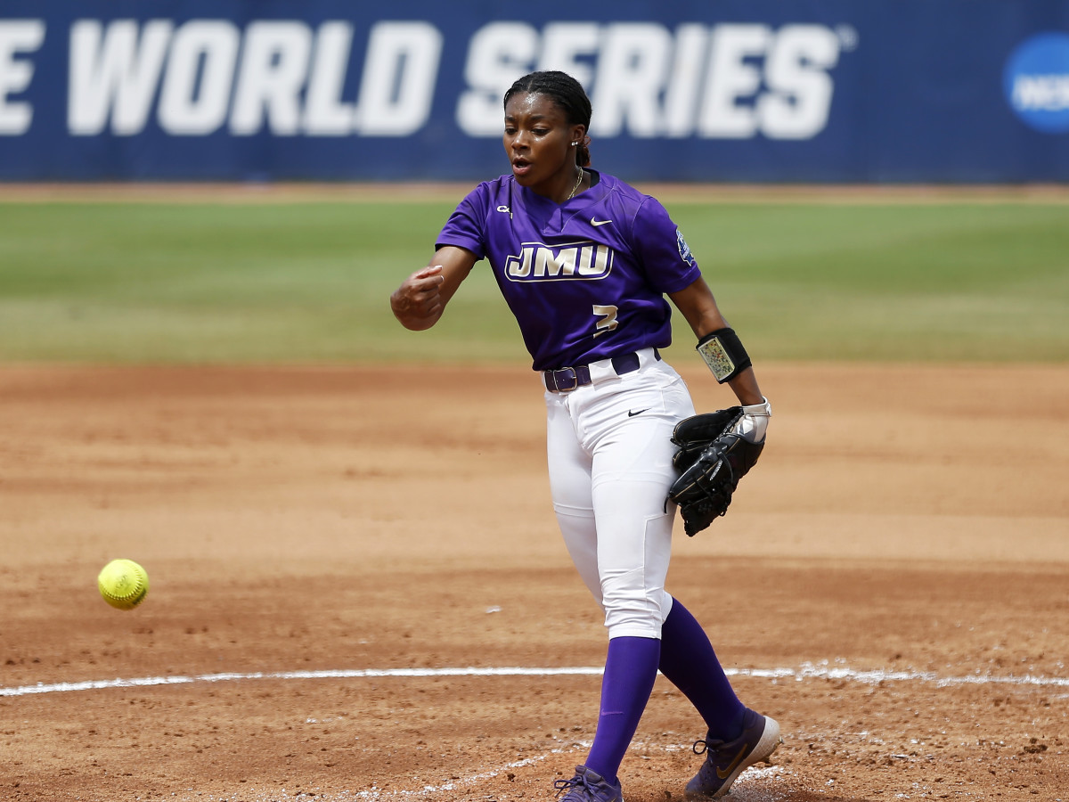 Jun 7, 2021; Oklahoma City, Oklahoma, USA; James Madison’s Odicci Alexander (3) delivers a pitch to Oklahoma during an NCAA Women’s College World Series semi finals game at USA Softball Hall of Fame Stadium.