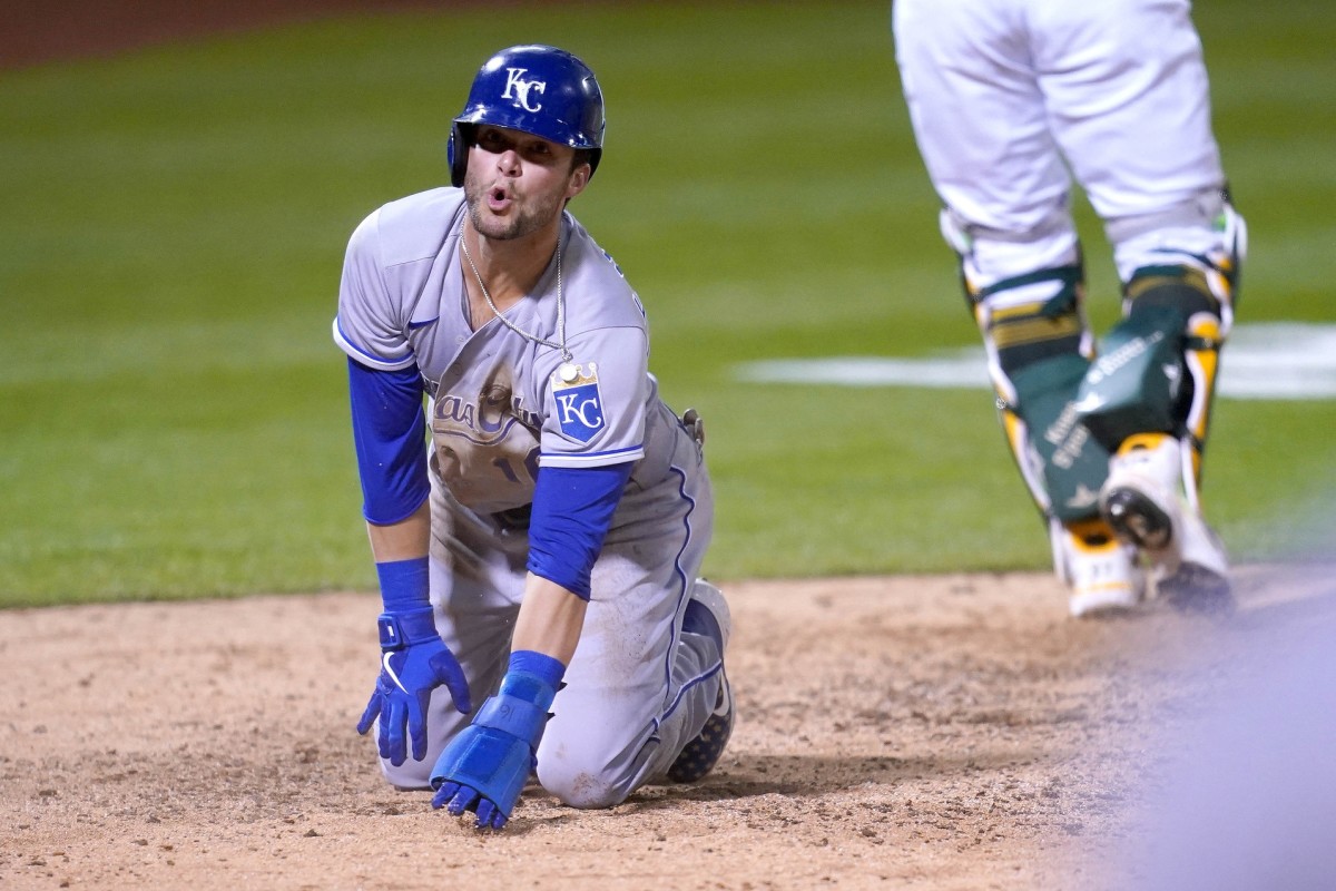 Jun 11, 2021; Oakland, California, USA; Kansas City Royals left fielder Andrew Benintendi (16) reacts after being thrown out at home against the Oakland Athletics during the eighth inning at RingCentral Coliseum. Mandatory Credit: Cary Edmondson-USA TODAY Sports