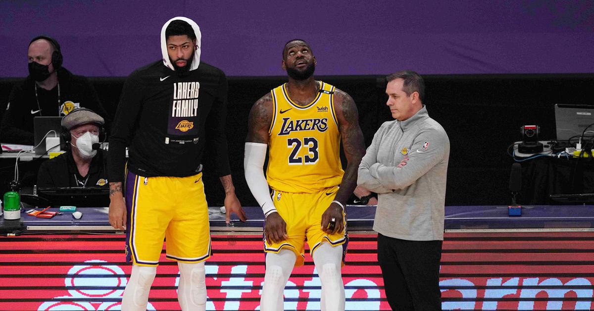 Jun 3, 2021; Los Angeles, California, USA; Los Angeles Lakers forward Anthony Davis (3), forward LeBron James (23) and coach Frank Vogel react in the second half during game six in the first round of the 2021 NBA Playoffs against the Phoenix Suns at Staples Center. Mandatory Credit: Kirby Lee-USA TODAY Sports