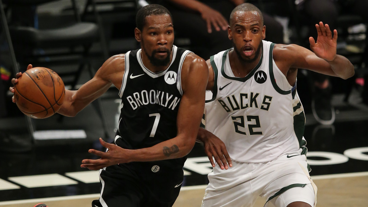 Kevin Durant drives to the hoop against Khris Middleton