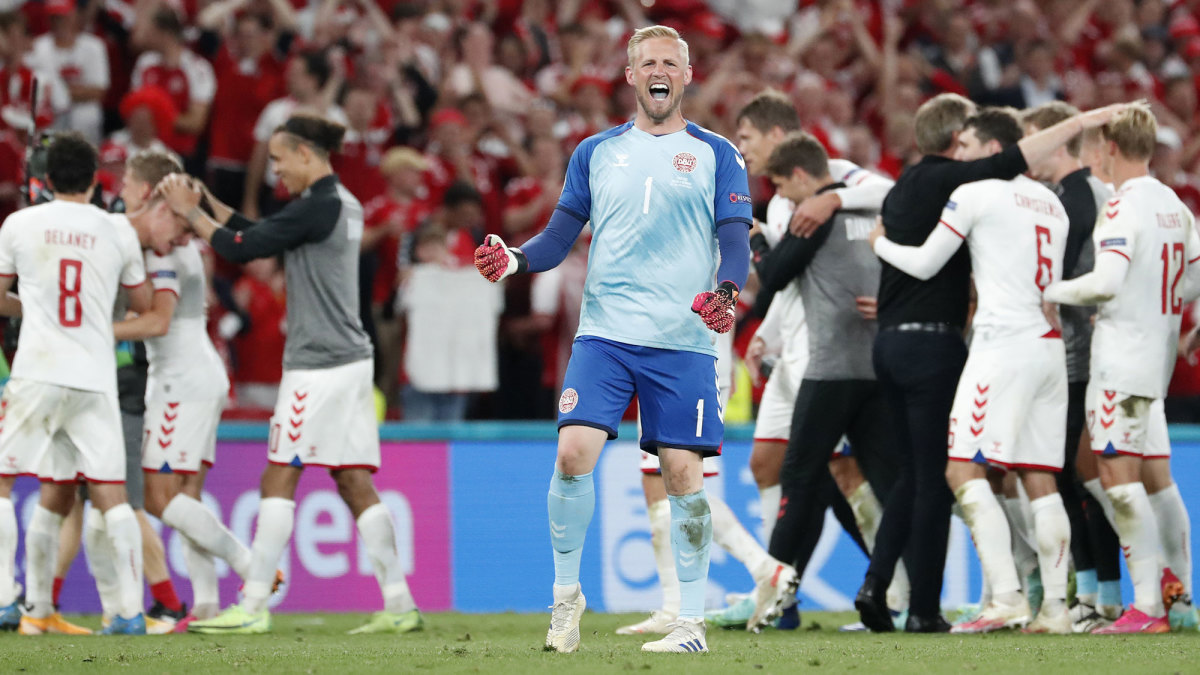 Denmark goalkeeper Kasper Schmeichel celebrates a win over Russia