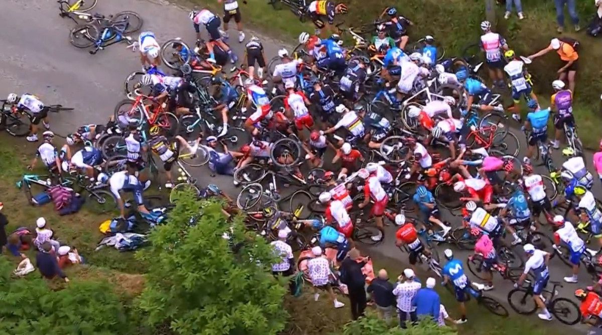 Tour De France Crash video Fan Sign Causes Pile up At Stage 1 Tour De France Crash video Fan Sign Causes Pile up At Stage 1