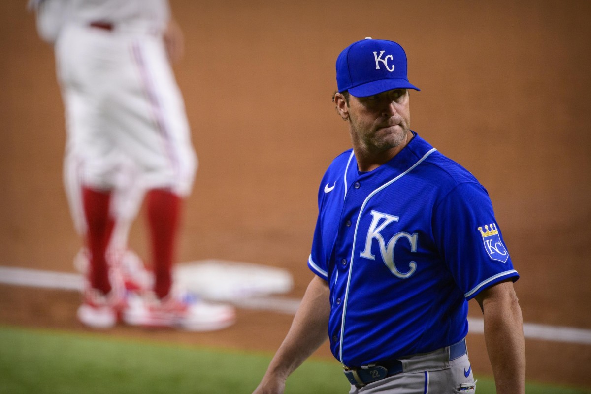 Jun 26, 2021; Arlington, Texas, USA; Kansas City Royals manager Mike Matheny (22) walks off the field during the second inning against the Texas Rangers at Globe Life Field. Mandatory Credit: Jerome Miron-USA TODAY Sports