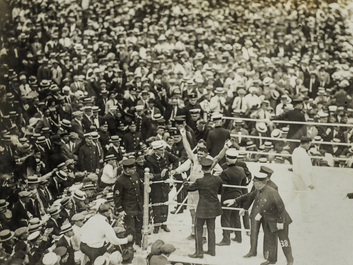 Dempsey had Carpentier on the ropes before celebrating his fourth round knockout. 