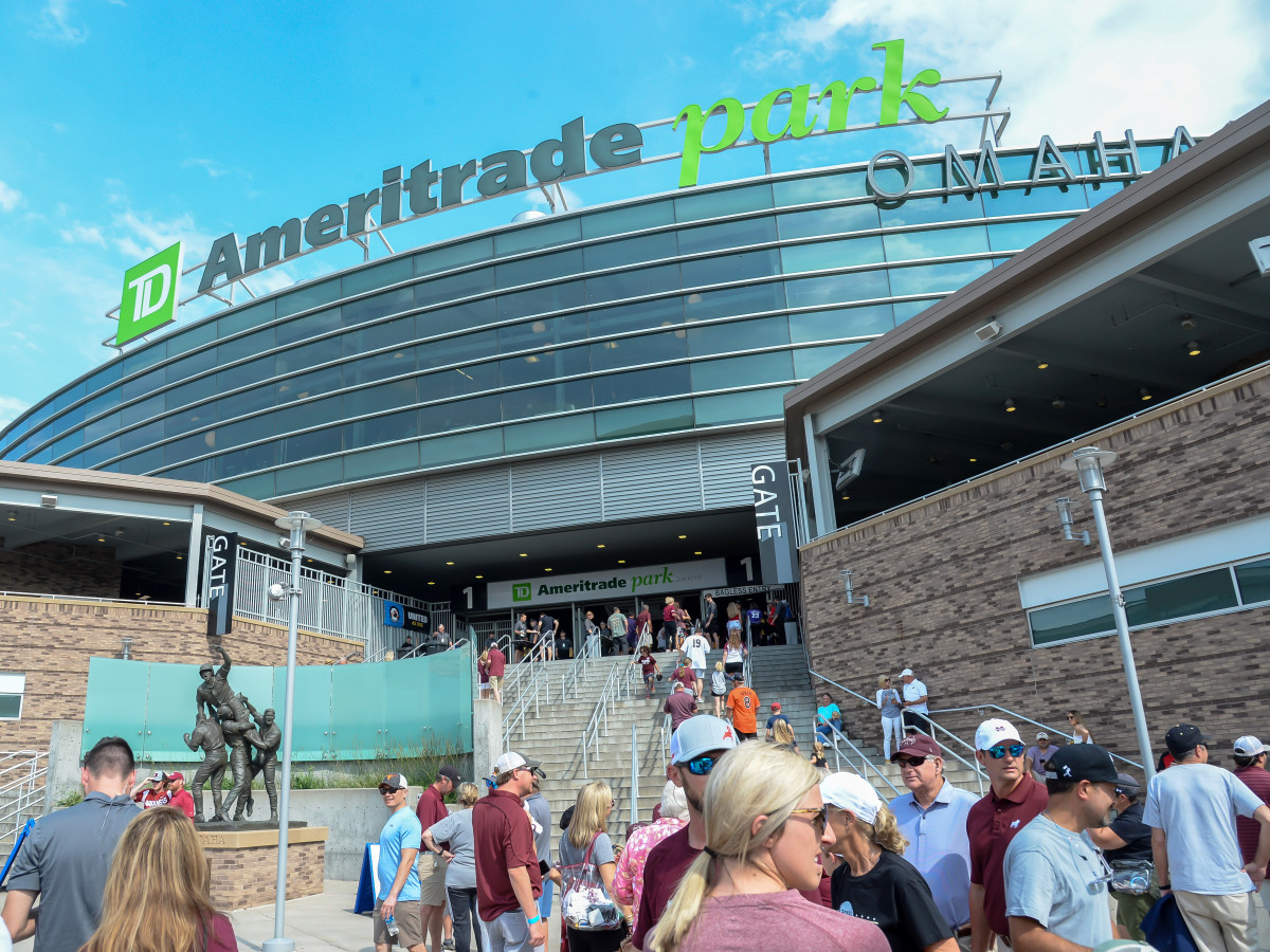 Jun 28, 2021; Omaha, Nebraska, USA;  Fans line up to enter the stadium before the game between the Vanderbilt Commodores and the Mississippi St. Bulldogs at TD Ameritrade Park.
