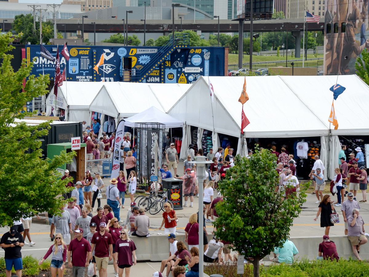 Jun 28, 2021; Omaha, Nebraska, USA;  Fans shop the merchandise tents before the game between the Vanderbilt Commodores and the Mississippi St. Bulldogs at TD Ameritrade Park.