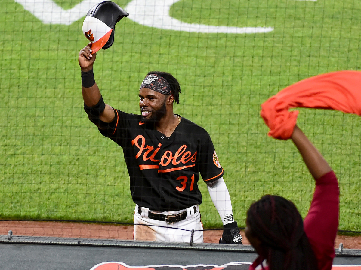 Jun 18, 2021; Baltimore, Maryland, USA; Baltimore Orioles outfielder Cedric Mullins (31) waves to the crowd after hitting a home run in the eighth inning against the Toronto Blue Jays at Oriole Park at Camden Yards.