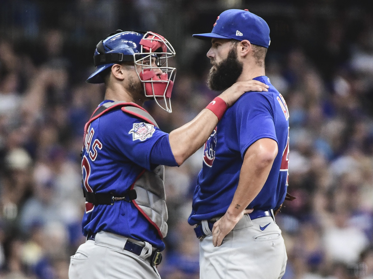 Chicago Cubs catcher Willson Contreras (40) talks to pitcher Jake Arrieta (49) in the first inning during the game against the Milwaukee Brewersat American Family Field.