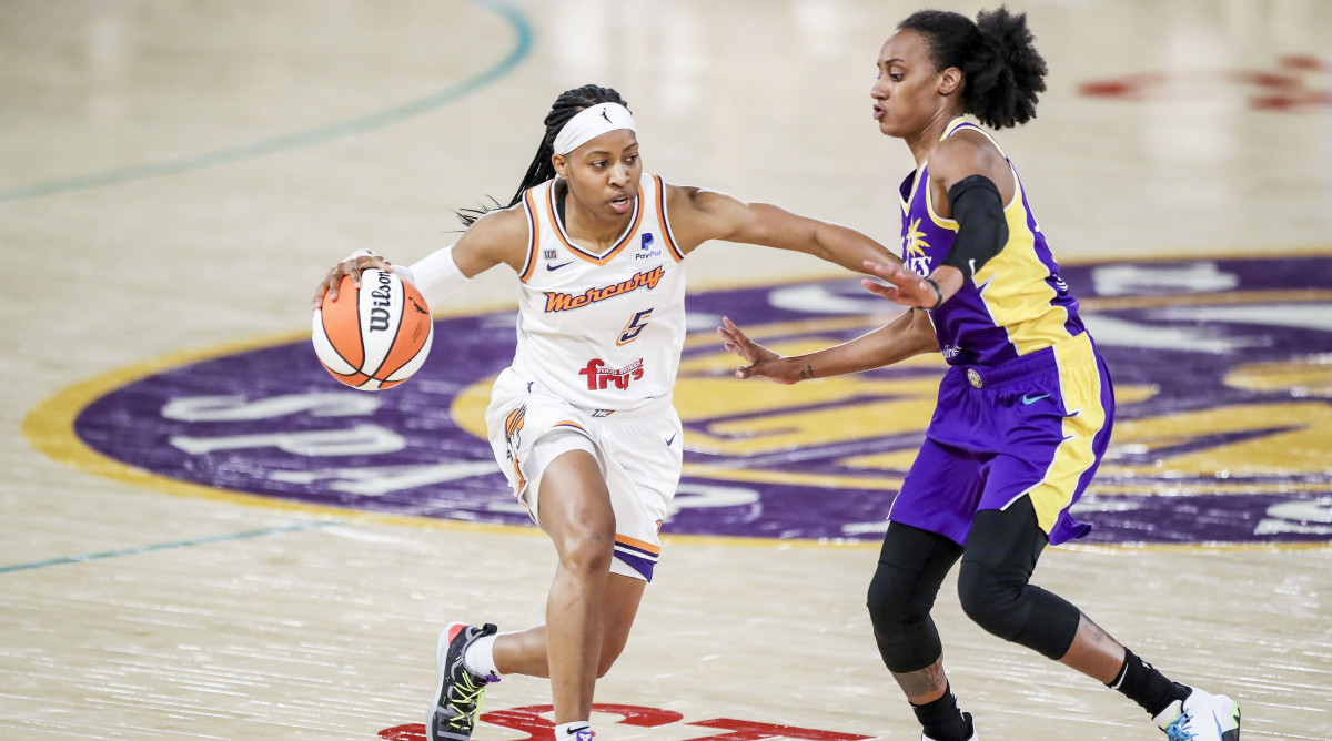 Brittney Sykes guarding a player on defense