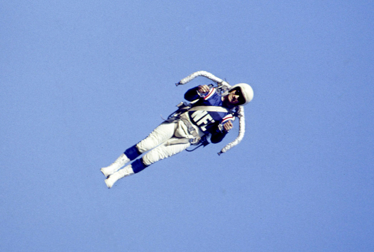 Willie Suitor pilots a rocket belt at Super Bowl I.