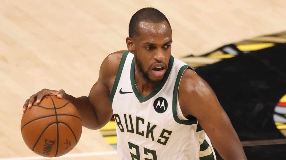 Milwaukee Bucks forward Khris Middleton (22) dribbles the ball