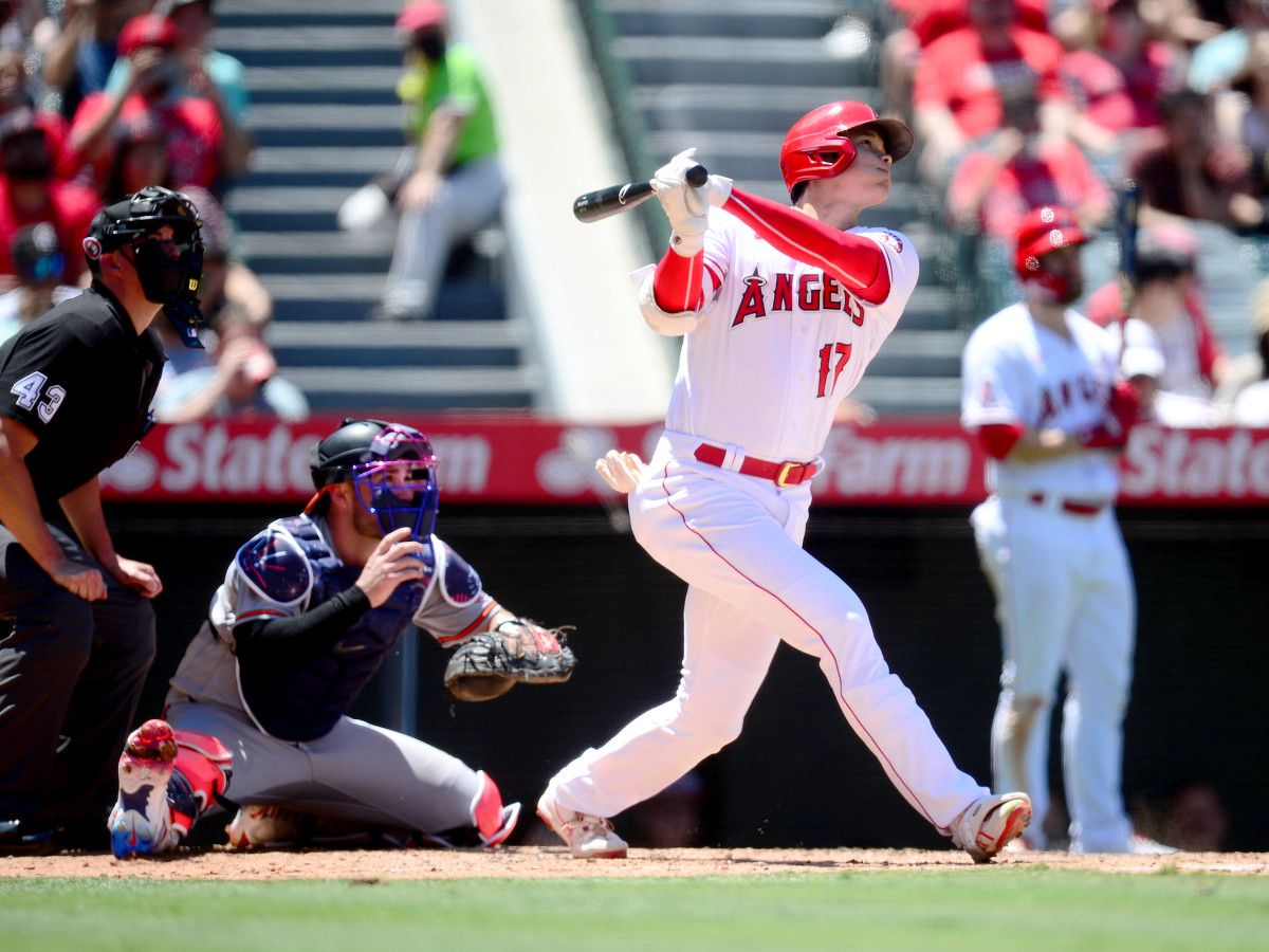 Jul 4, 2021; Anaheim, California, USA; Los Angeles Angels designated hitter Shohei Ohtani (17) hits a solo home run against the Baltimore Orioles during the third inning at Angel Stadium.