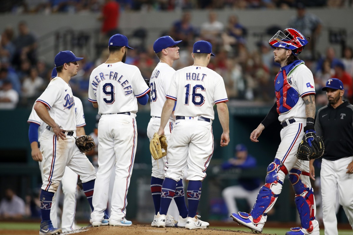 Jul 5, 2021; Arlington, Texas, USA; Texas Rangers relief pitcher Kolby Allard (39) on the mound with his teammates in the sixth inning against the Detroit Tigers at Globe Life Field.