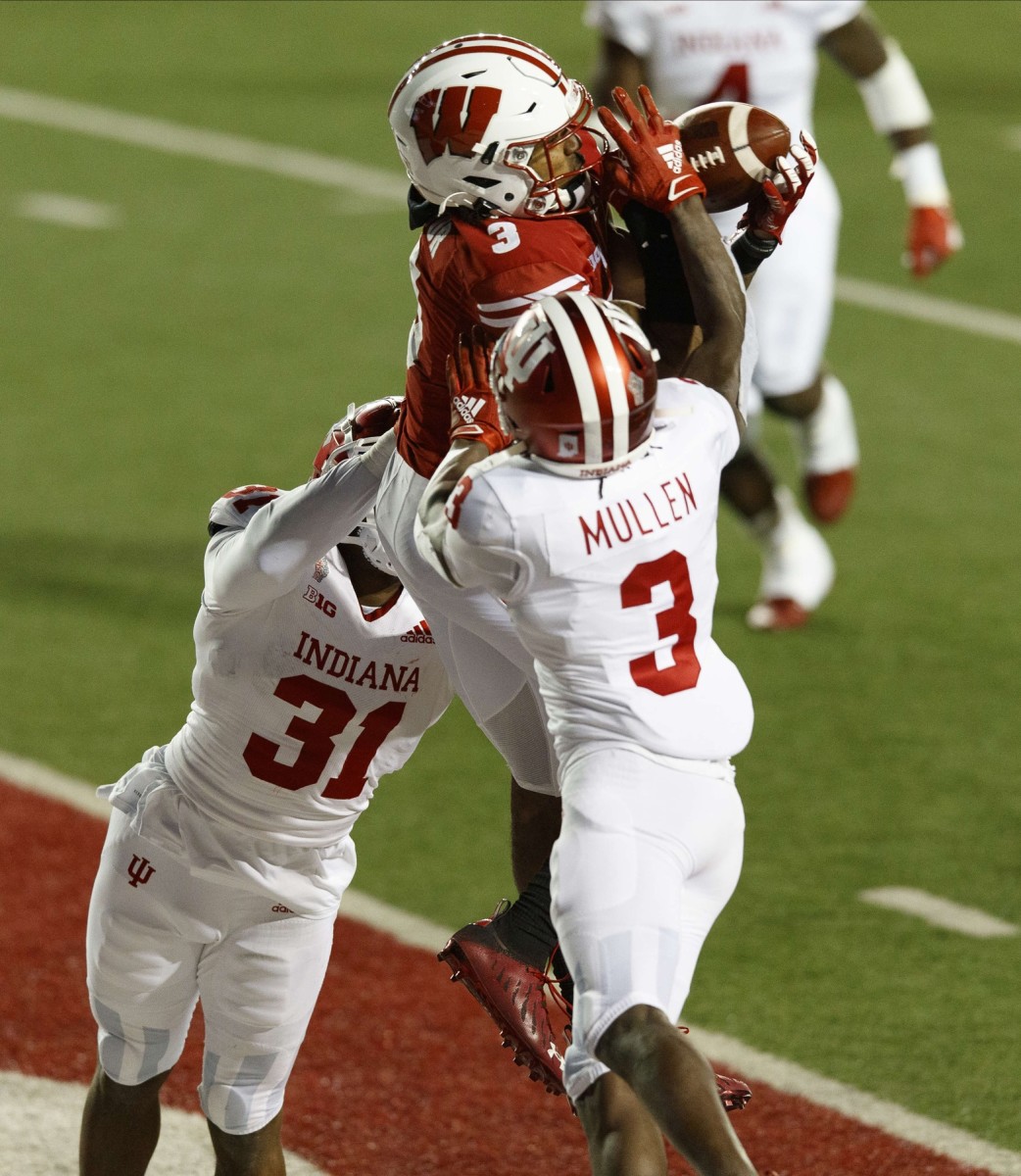 Indiana defensive backs Tiawan Mullen (3) and Bryant Fitzgerald (31) break up the pass intended for Wisconsin's Kendric Pryor.  (Jeff Hanisch-USA TODAY Sports)