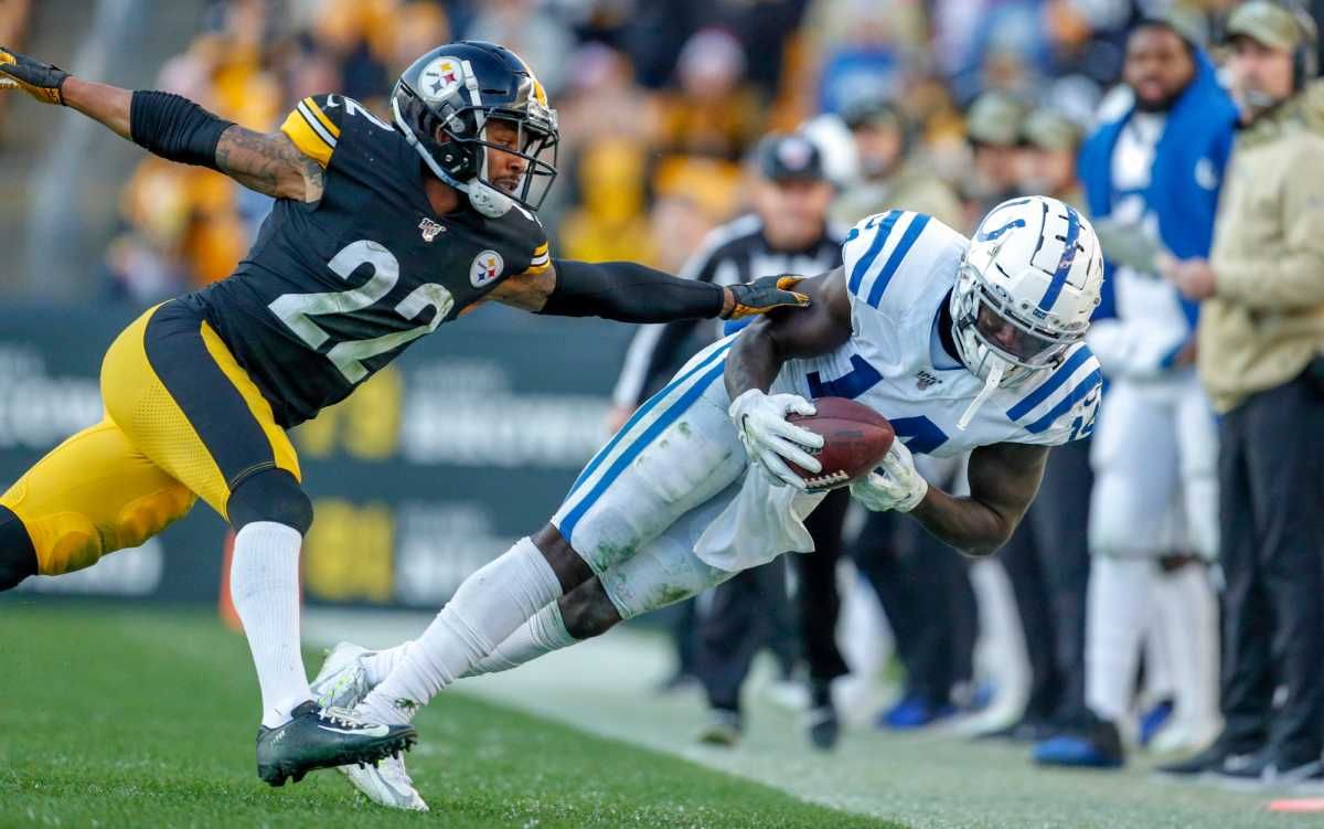 Indianapolis Colts wide receiver Zach Pascal (14) pulls in a sideline catch around Pittsburgh Steelers cornerback Steven Nelson (22) at Heinz Field in Pittsburgh, Pa., on Sunday, Nov. 3, 2019. Indianapolis Colts Vs Pittsburgh Steelers Week 9 Nfl Regular Season