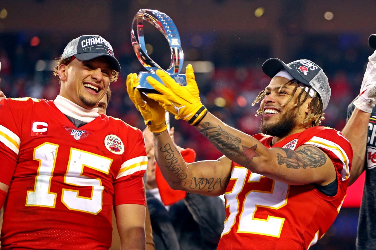 Jan 19, 2020; Kansas City, Missouri, USA; Kansas City Chiefs quarterback Patrick Mahomes (15) and strong safety Tyrann Mathieu (32) celebrate with the Lamar Hunt Trophy after beating the Tennessee Titans in the AFC Championship Game at Arrowhead Stadium. Mandatory Credit: Mark J. Rebilas-USA TODAY Sports