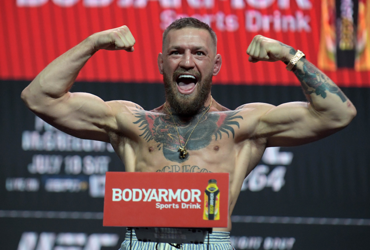 Conor McGregor reacts during weigh ins for UFC 264 at T-Mobile Arena.