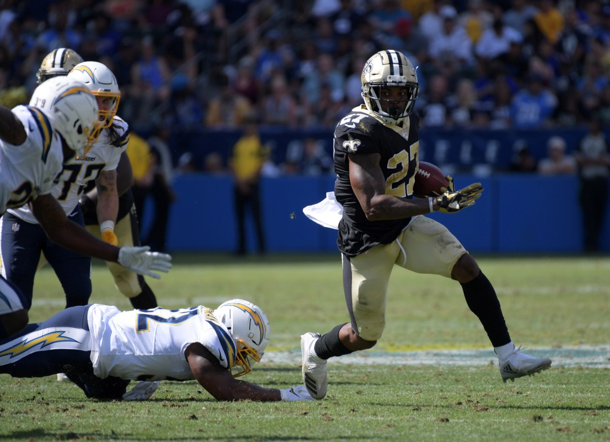 New Orleans Saints running back Dwayne Washington (27) carries the ball against the Chargers. Mandatory Credit: Kirby Lee-USA TODAY Sports