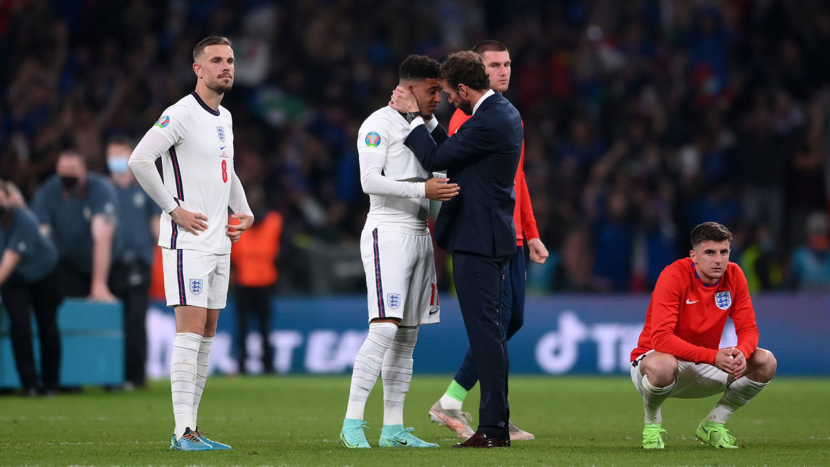 Gareth Southgate consoles Jadon Sancho after England's penalty kick defeat to Italy