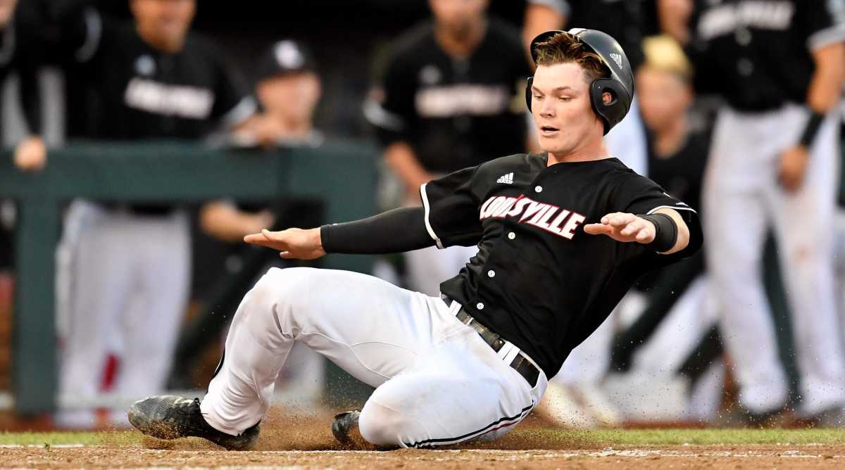 Louisville catcher Henry Davis scores against Vanderbilt during the seventh inning of the College World Series game at TD Ameritrade Park Friday.