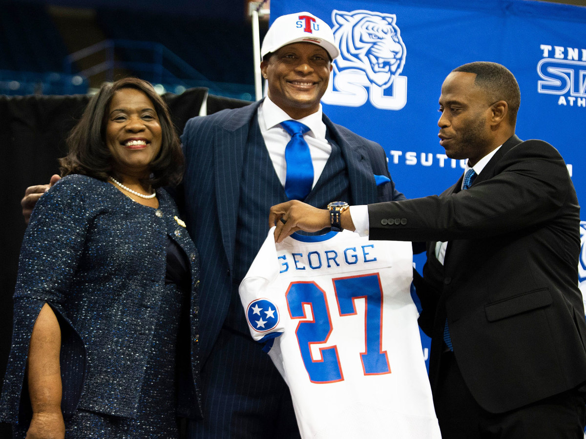Tennessee State's Eddie George receives a jersey