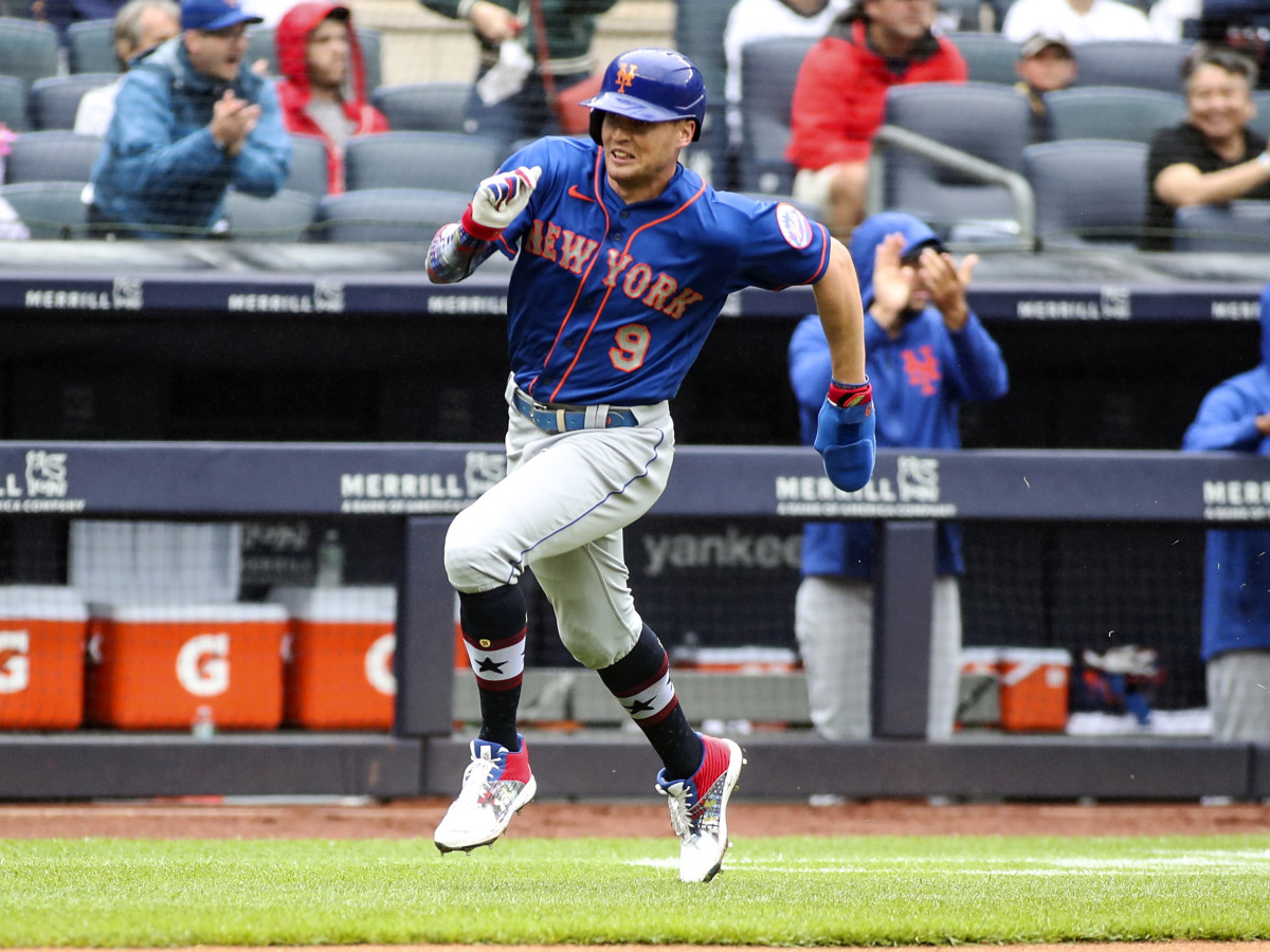 Jul 3, 2021; Bronx, New York, USA;  New York Mets center fielder Brandon Nimmo (9) heads home to score the first run of the game in the fifth inning against the New York Yankees at Yankee Stadium.